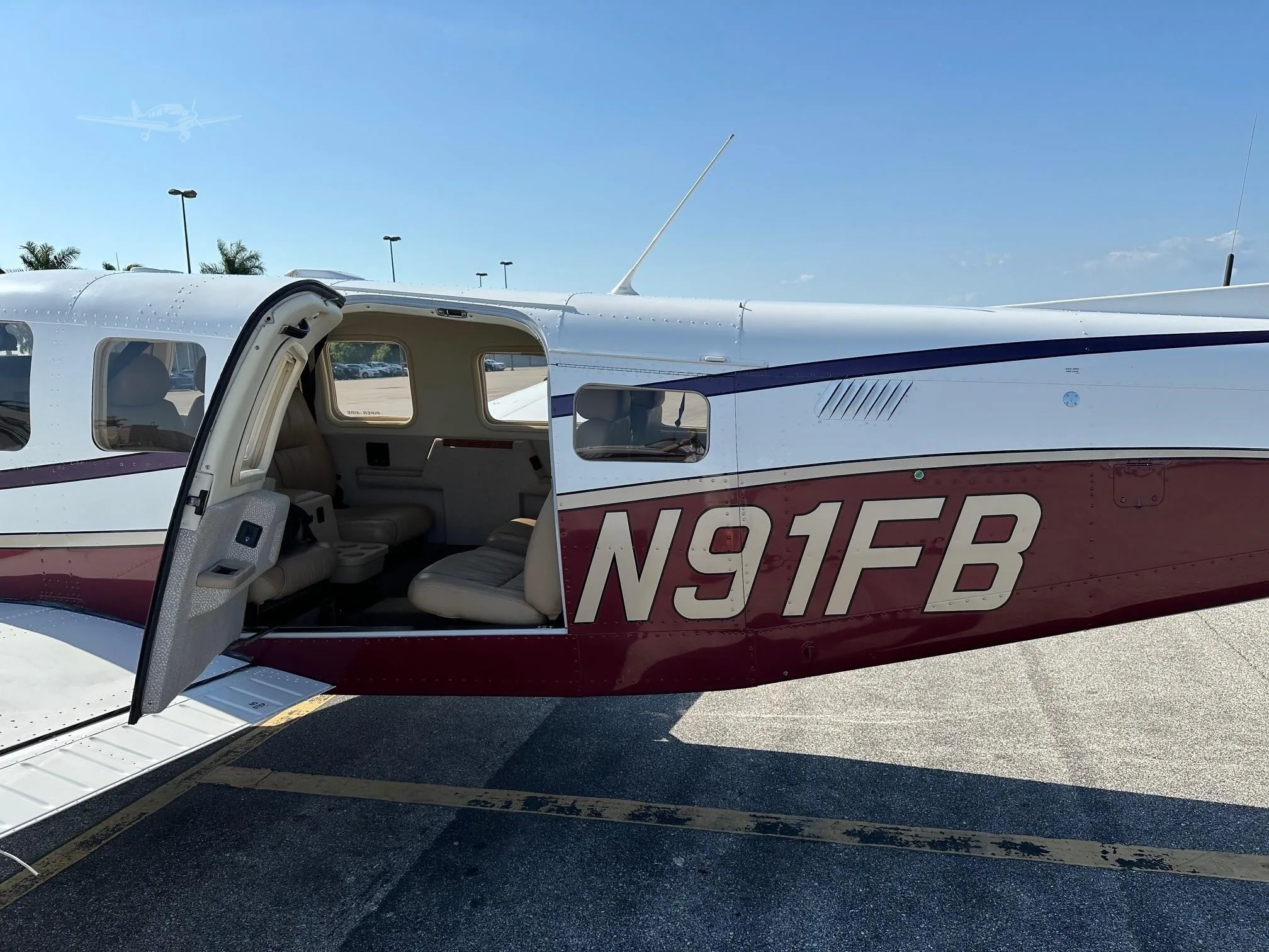 Exterior view of a 2003 PIPER SARATOGA II TC, N91FB.