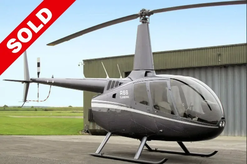 Exterior view of a 2005 Robinson R22 Beta II.