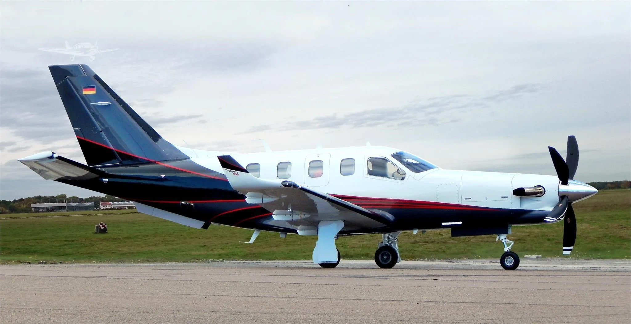 Exterior view of a 2015 DAHER TBM 900, D-FSBG.
