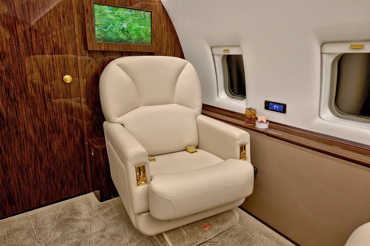 Cabin interior of a 1997 Bombardier Challenger 604 — Thoroughbred Aviation.