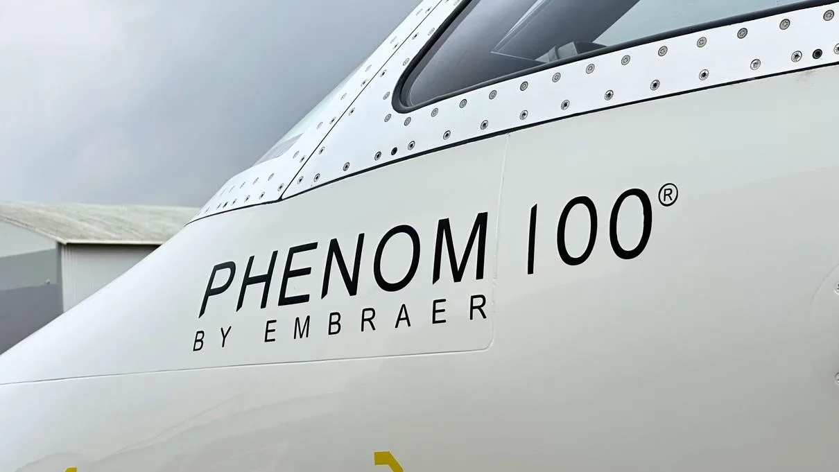 Marketing image of a 2010 EMBRAER PHENOM 100.