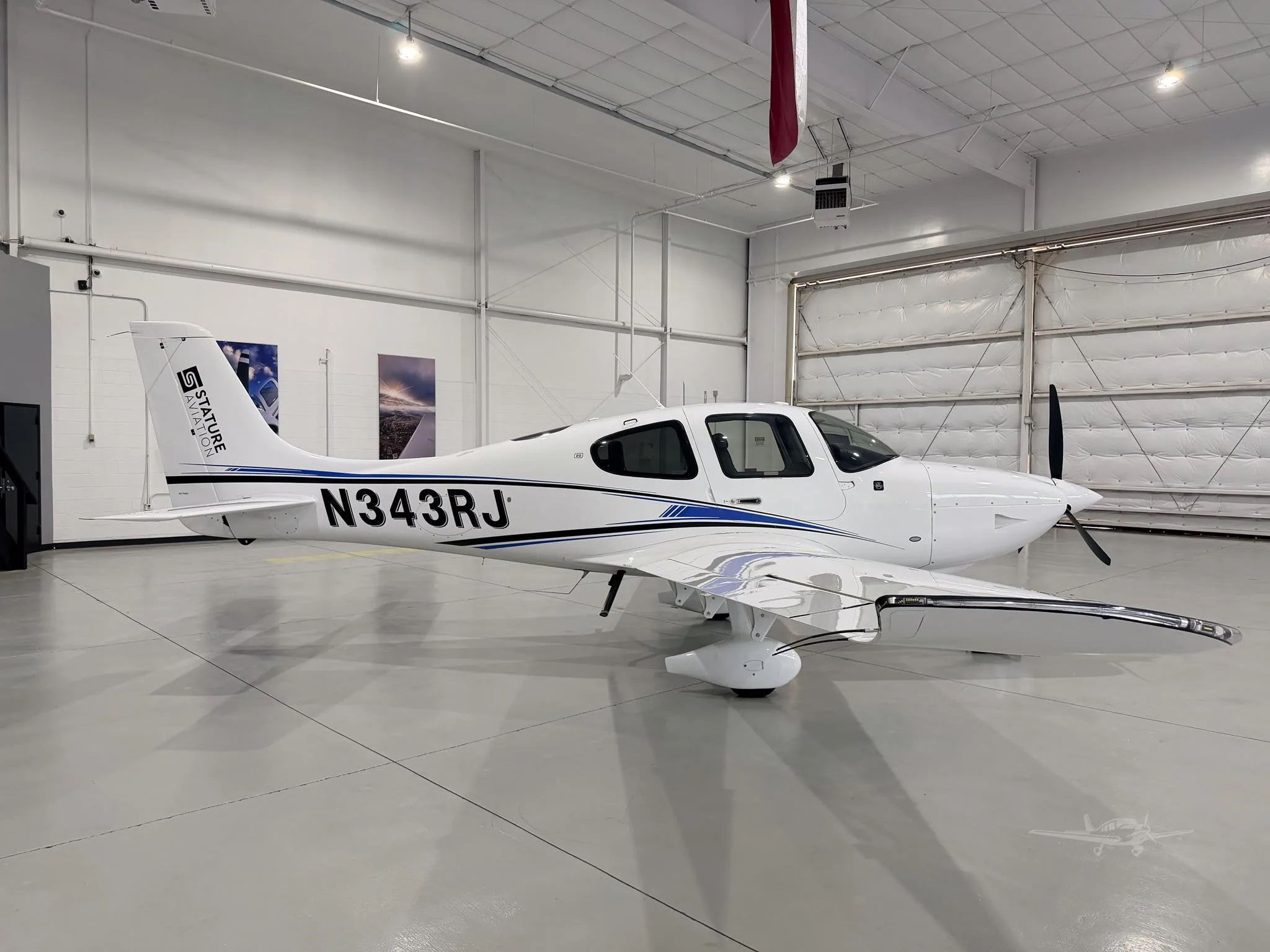 Exterior view of a 2022 CIRRUS SR20-G6, N343RJ.