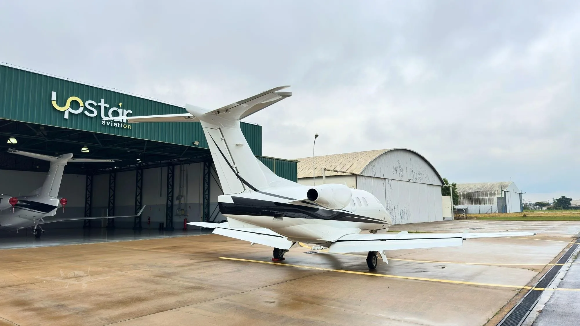 Exterior view of a 2010 EMBRAER PHENOM 100.