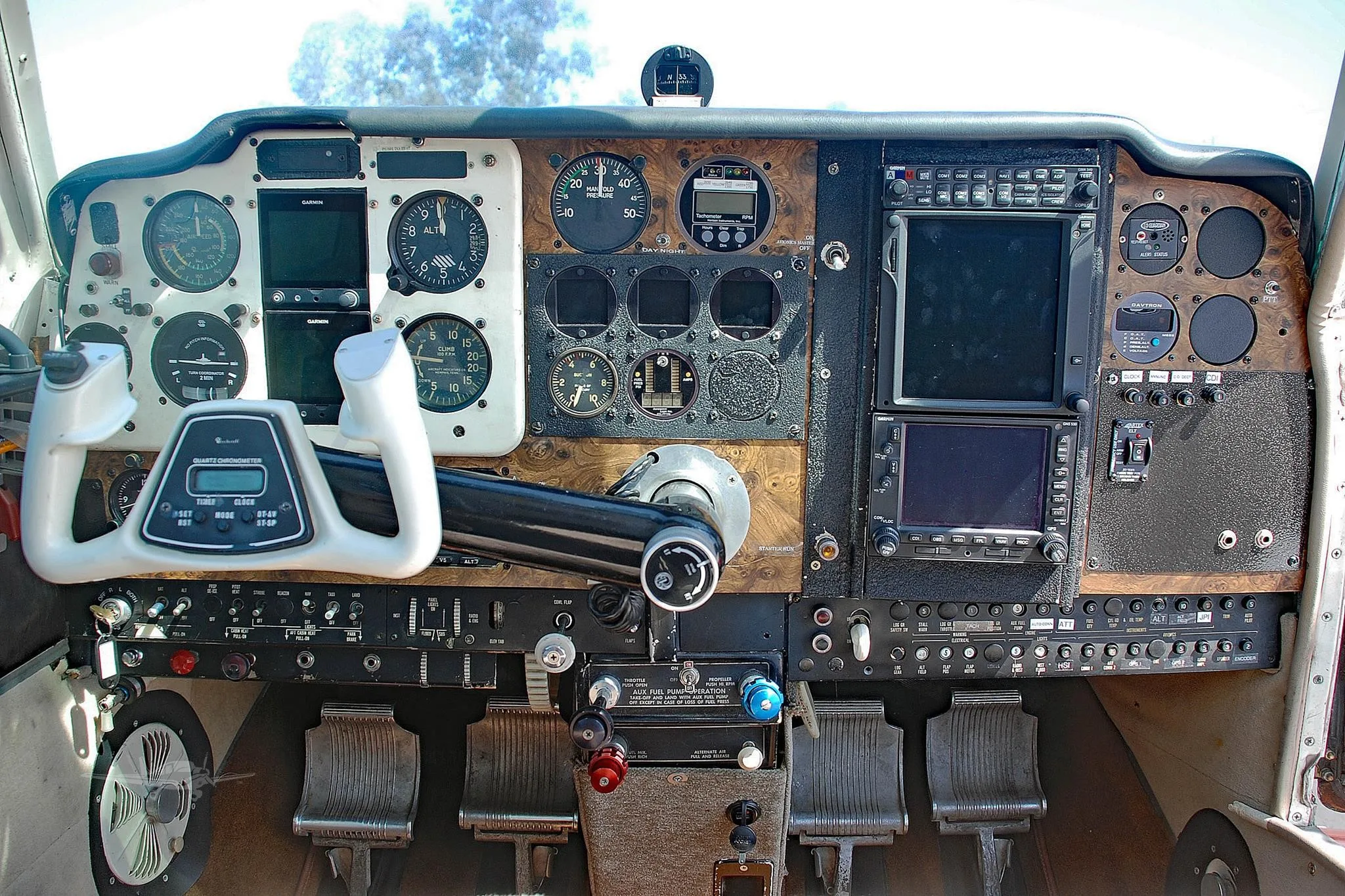 Cockpit and instrument panel of a 1956 BEECHCRAFT G35 BONANZA.