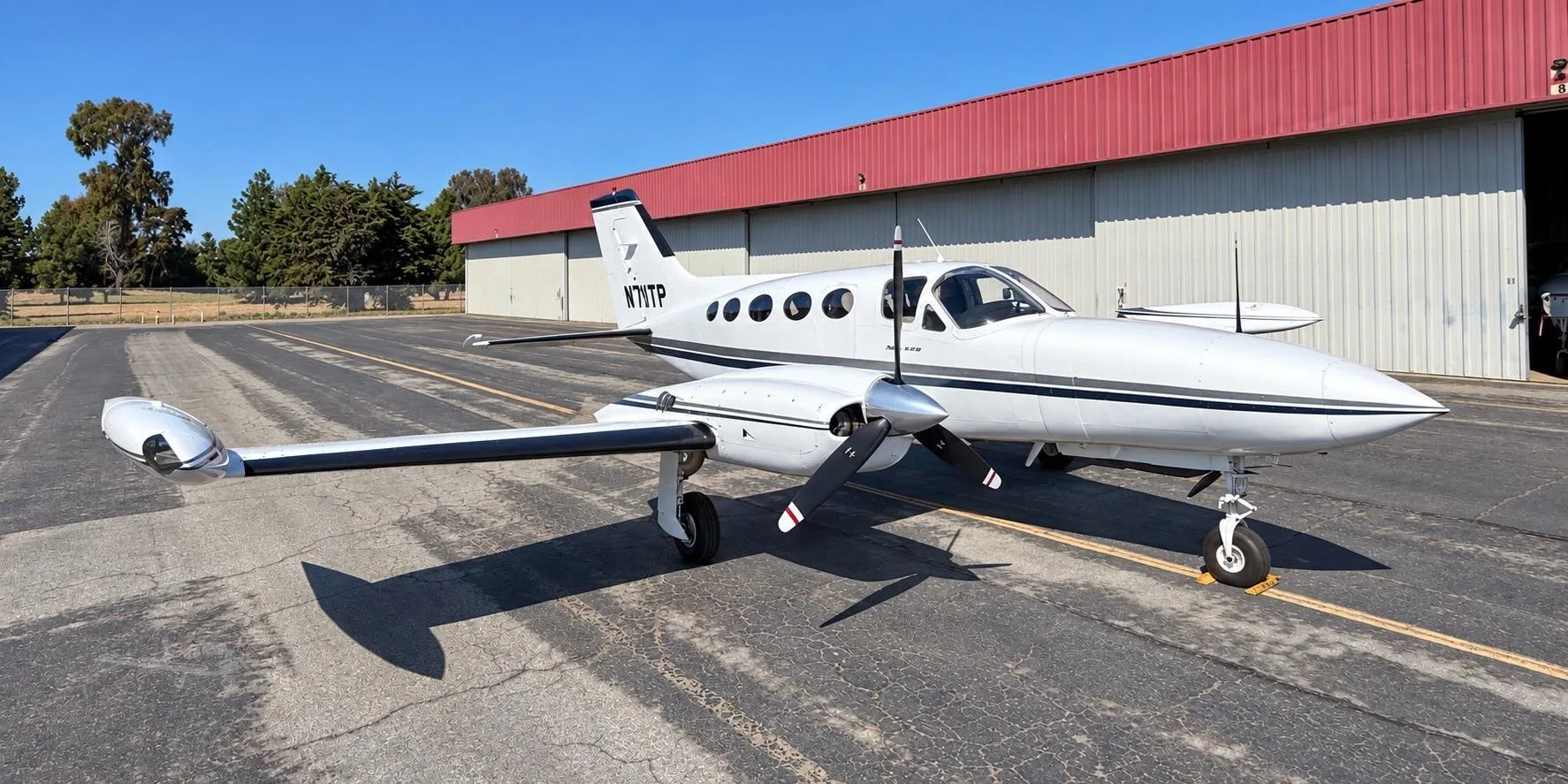 Exterior view of a 1973 CESSNA 421B, N711TP.