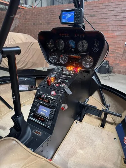 Cockpit and instrument panel of a 2008 ROBINSON R44 RAVEN II.