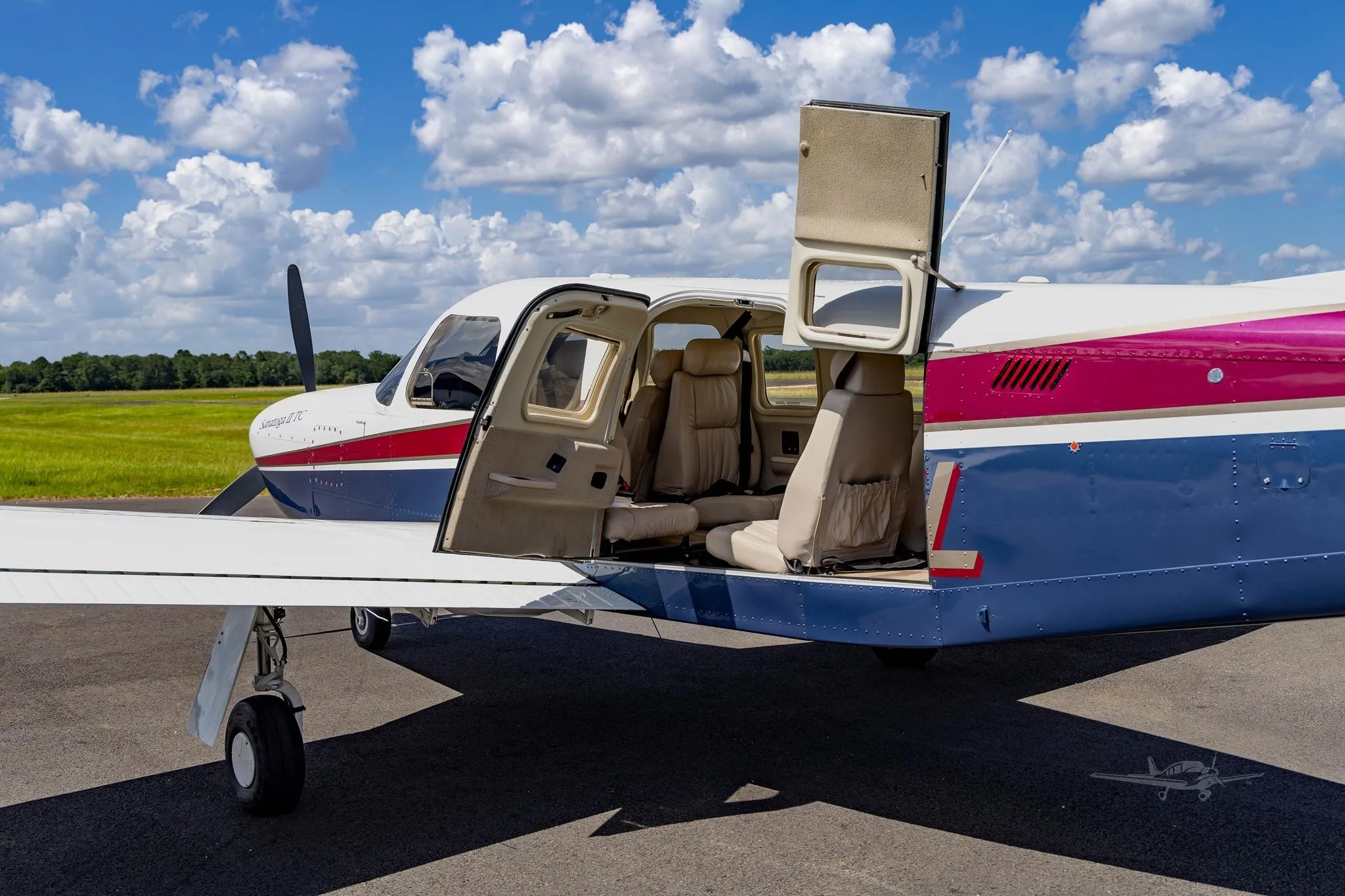 Exterior view of a 2000 PIPER SARATOGA II TC, N97HL.