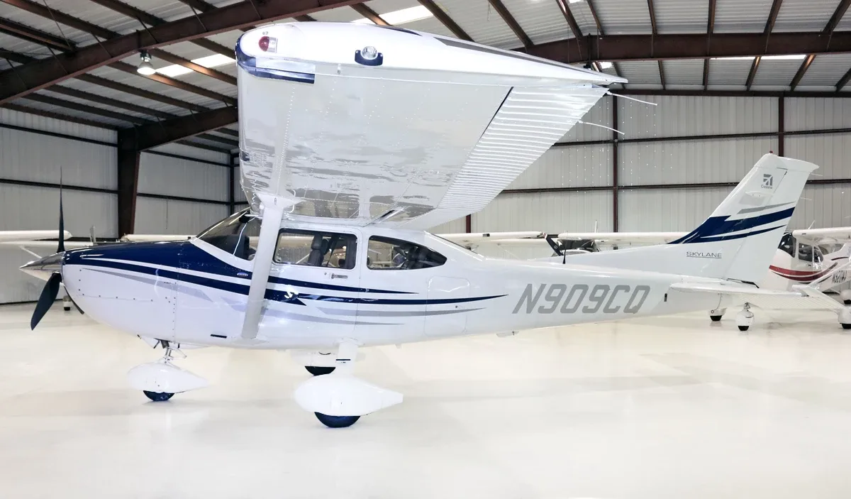 Exterior view of a Cessna Piston 182, N656JM.