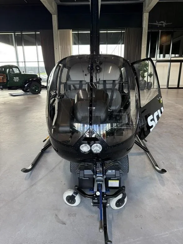 Exterior view of a 2017 ROBINSON R44 RAVEN II, ZT-HAE.
