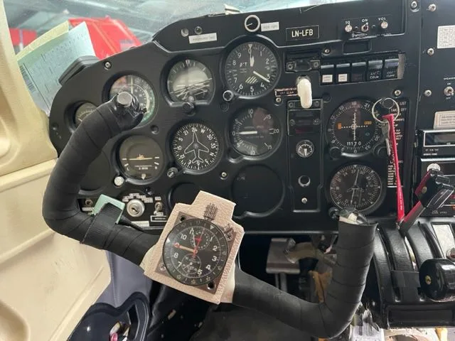 Cockpit and instrument panel of a 1969 Mooney M20C Ranger.
