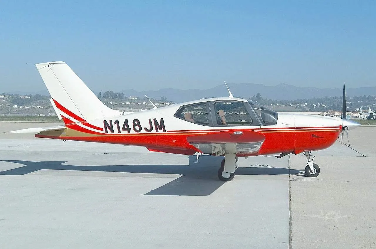 Exterior view of a 2000 SOCATA TB-21 GT TRINIDAD, N148JM.