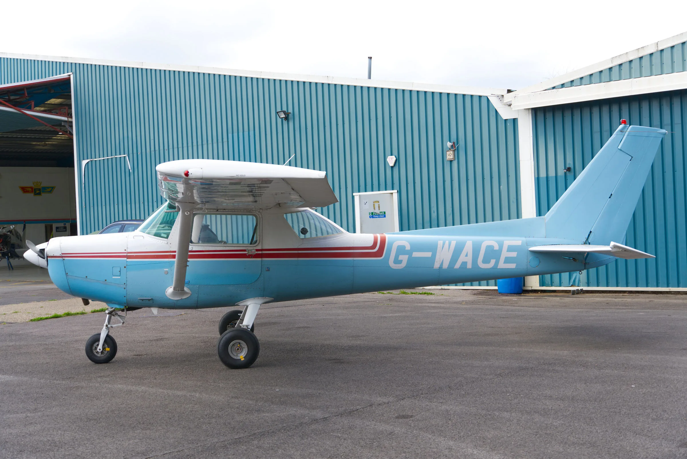 Exterior view of a 1986 Cessna 152, G-WACE.