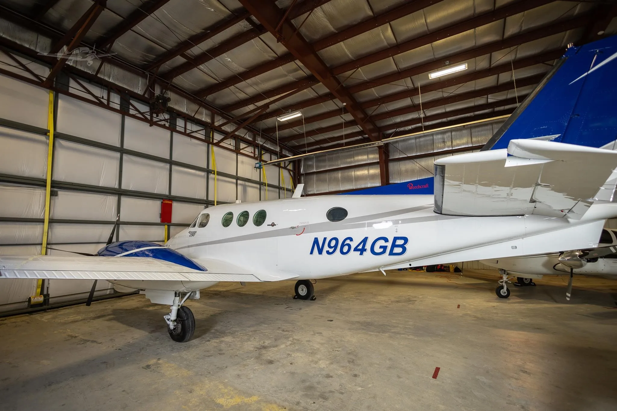 Exterior view of a 1982 BEECHCRAFT KING AIR C90, N964GB.