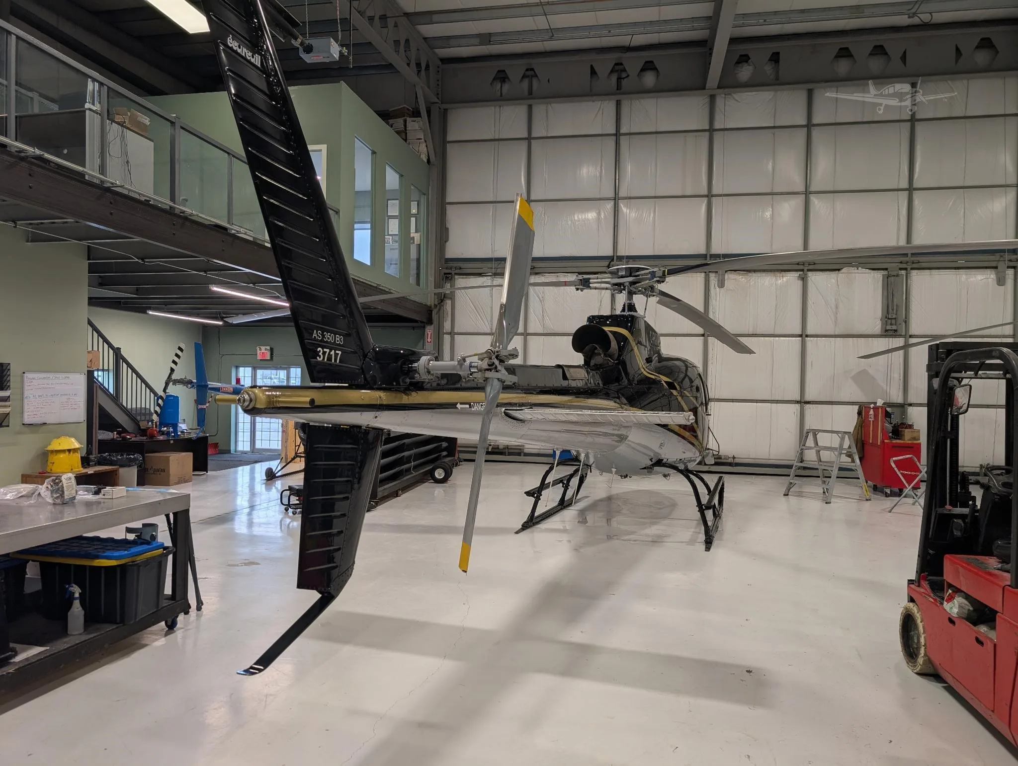 Exterior view of a 2003 EUROCOPTER AS350B-3, C-FKVD.