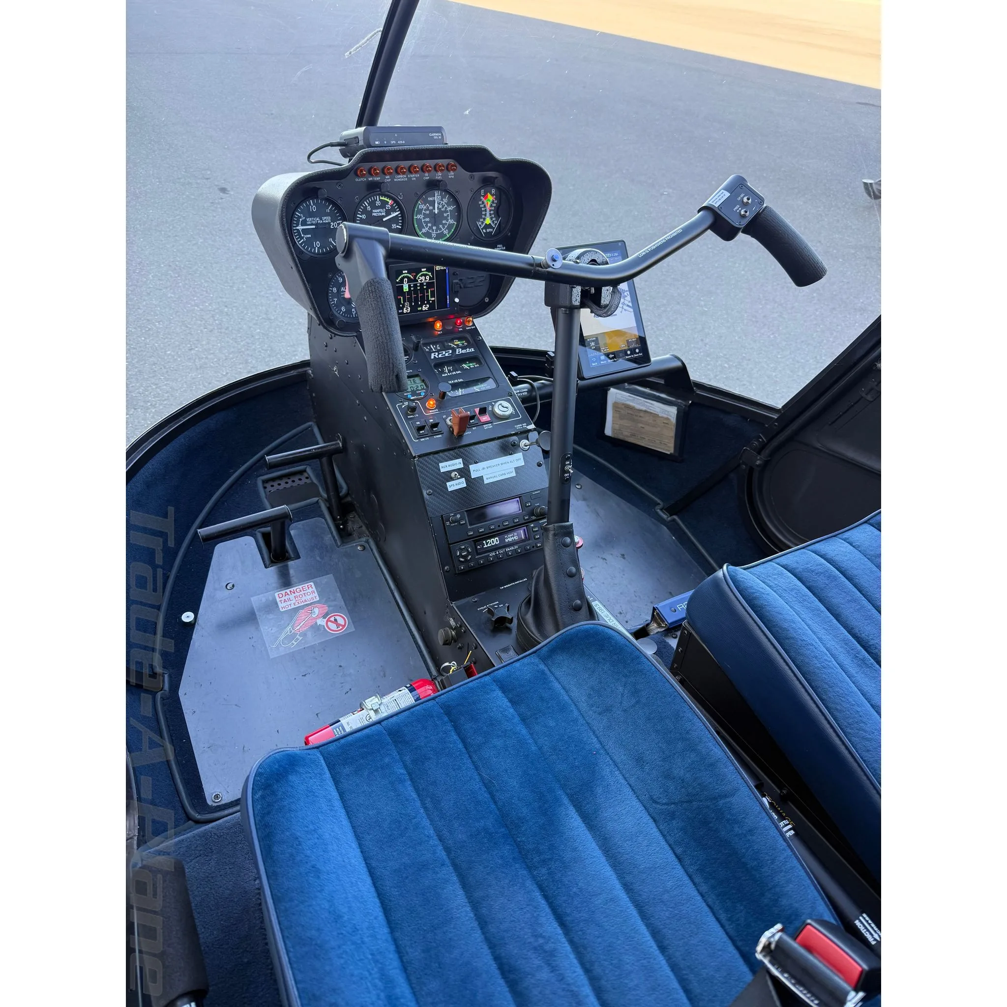Cockpit and instrument panel of a 1990 ROBINSON R22 BETA II.