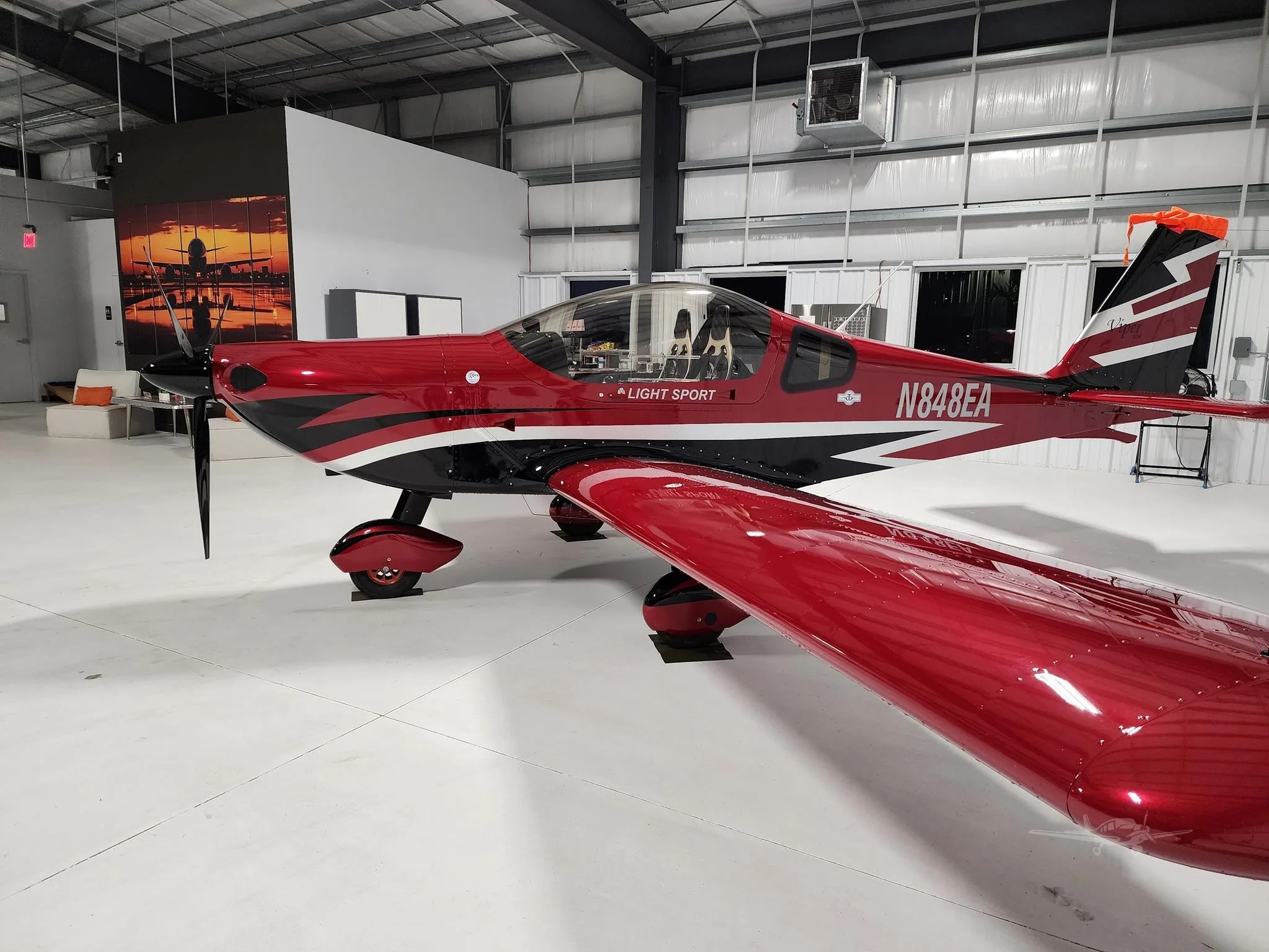 Exterior view of a 2025 TOMARK AERO VIPER SD4, N848EA.