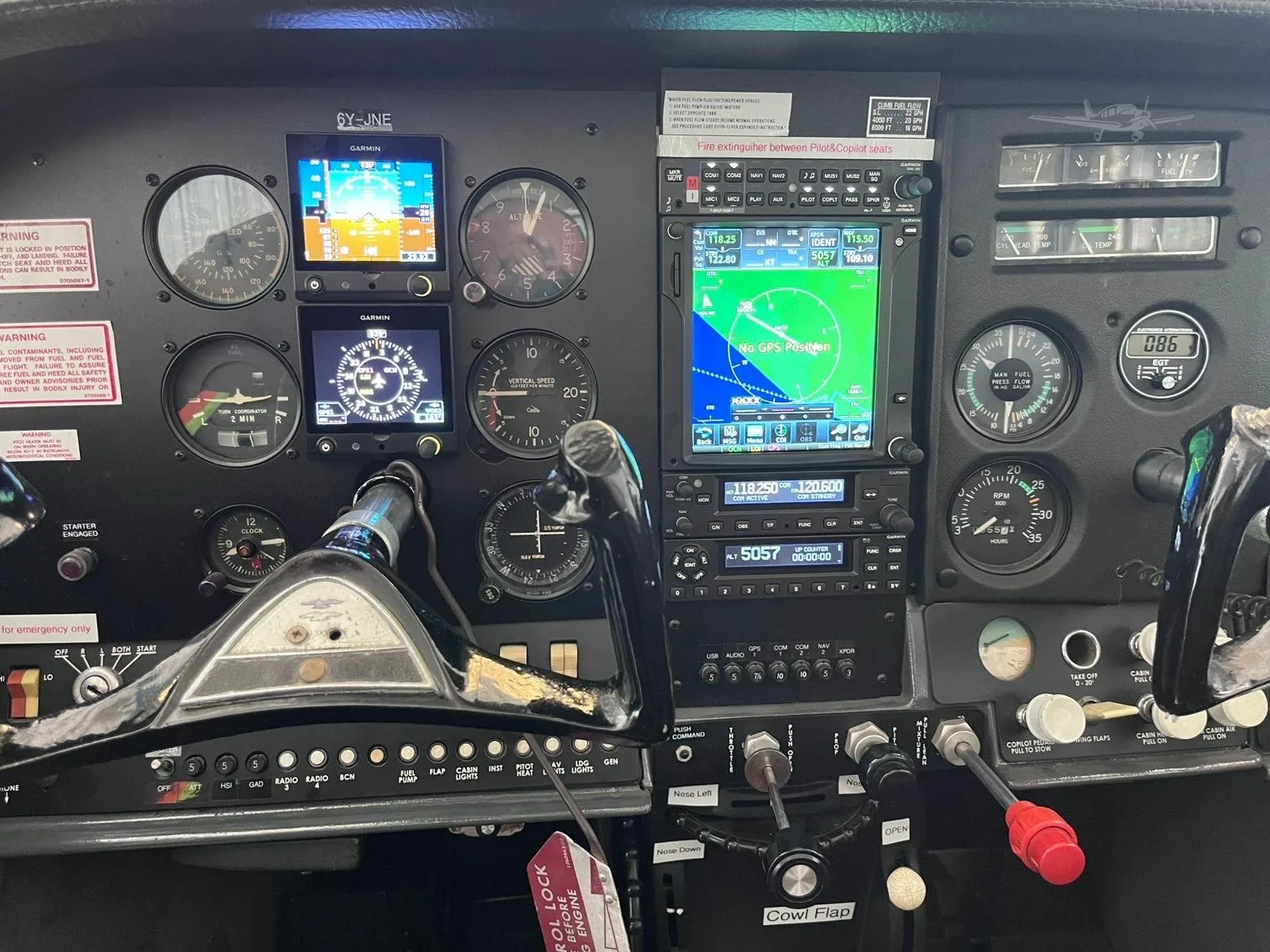 Cockpit and instrument panel of a 1967 CESSNA P206 SUPER SKYLANE.