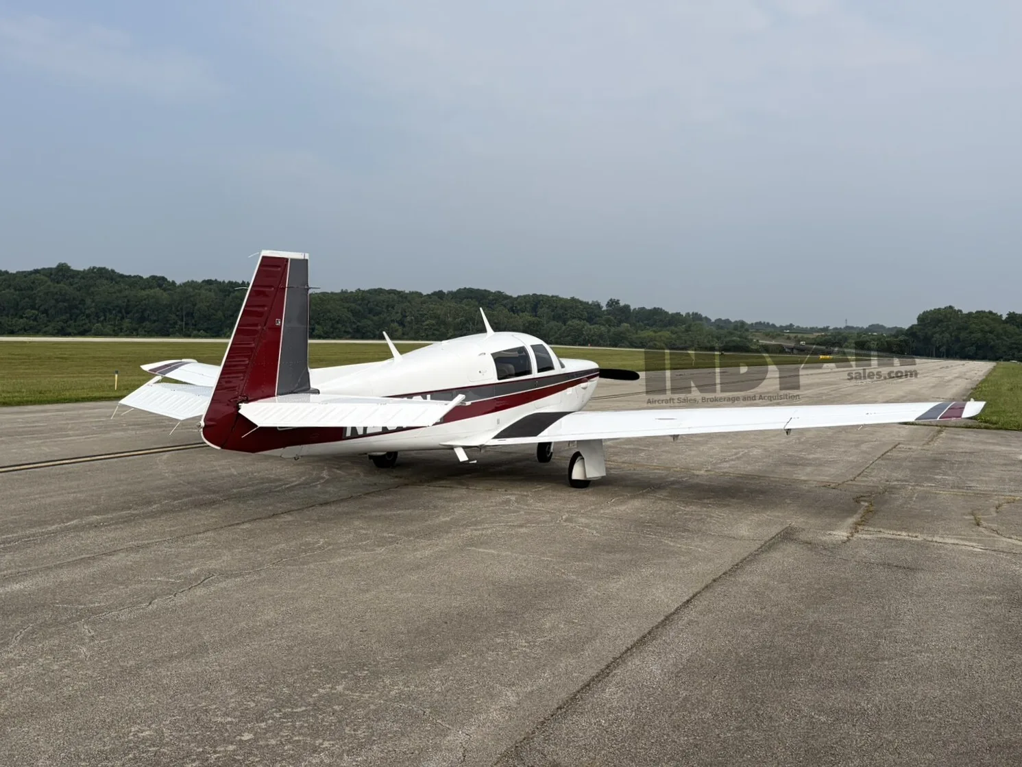 Exterior view of a Mooney M20K, N231GL.
