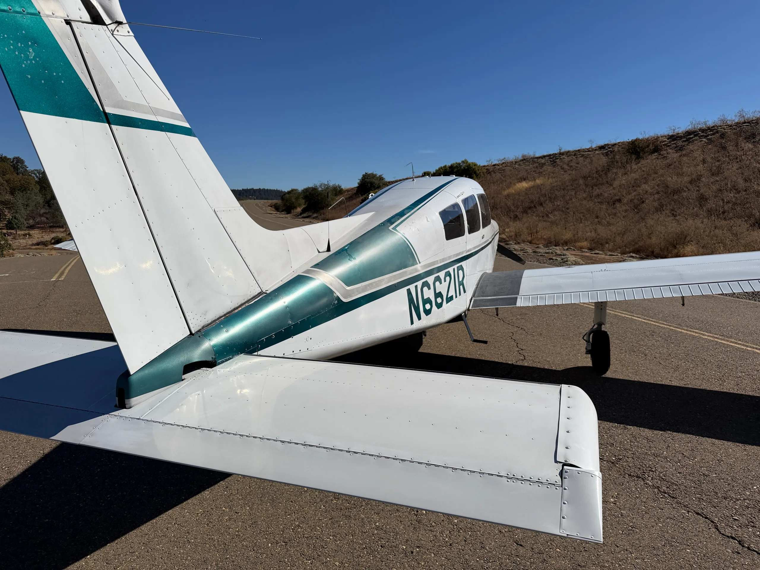 Exterior view of a 1974 Beechcraft Sundowner C23 $69,000 - (Here at Placerville), N6621R.