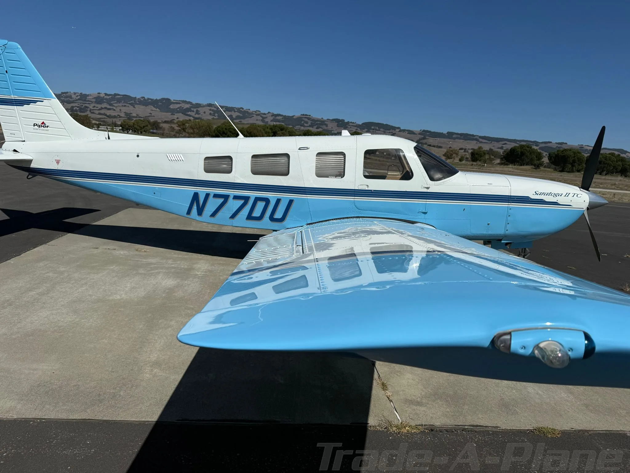 Exterior view of a 1999 PIPER SARATOGA II TC (1998, N77DU.