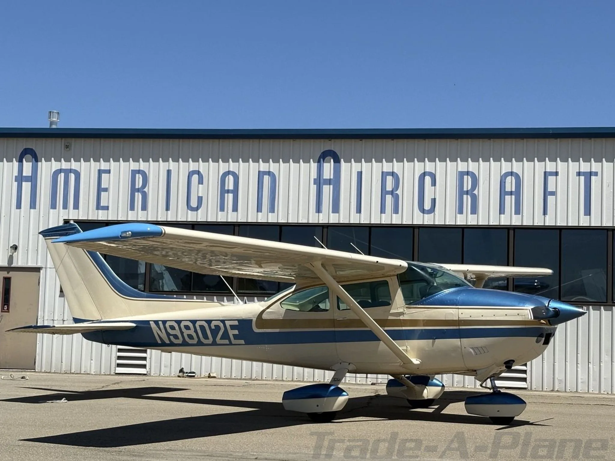 Exterior view of a 1975 CESSNA 182P SKYLANE, N9802E.