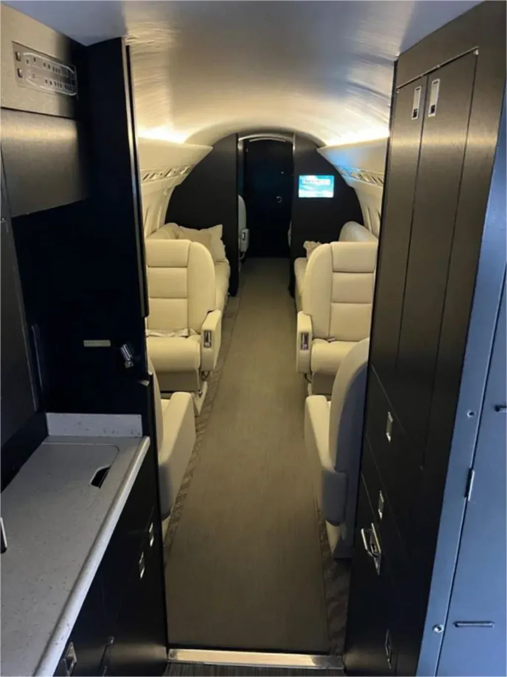 Cabin interior of a 1995 Dassault Falcon 900B.