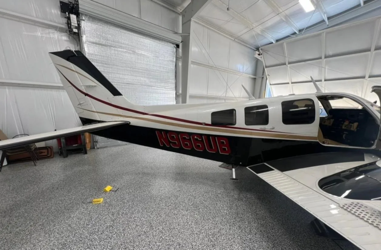 Exterior view of a 1977 BEECHCRAFT 58P BARON, N966UB.