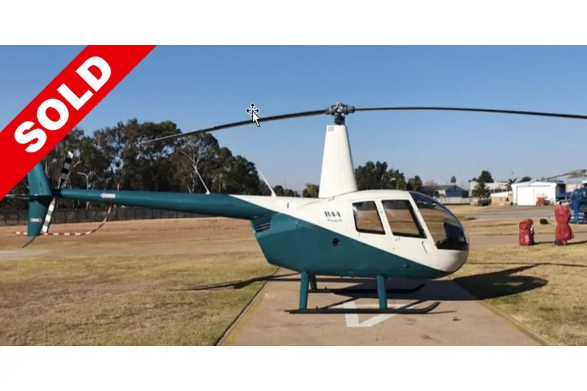 Exterior view of a 2004 Robinson R44 Raven II.