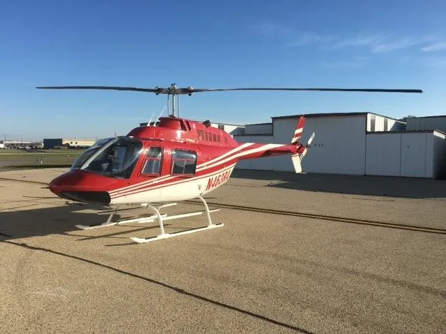 Exterior view of a 1997 BELL 206B III, N463RA.