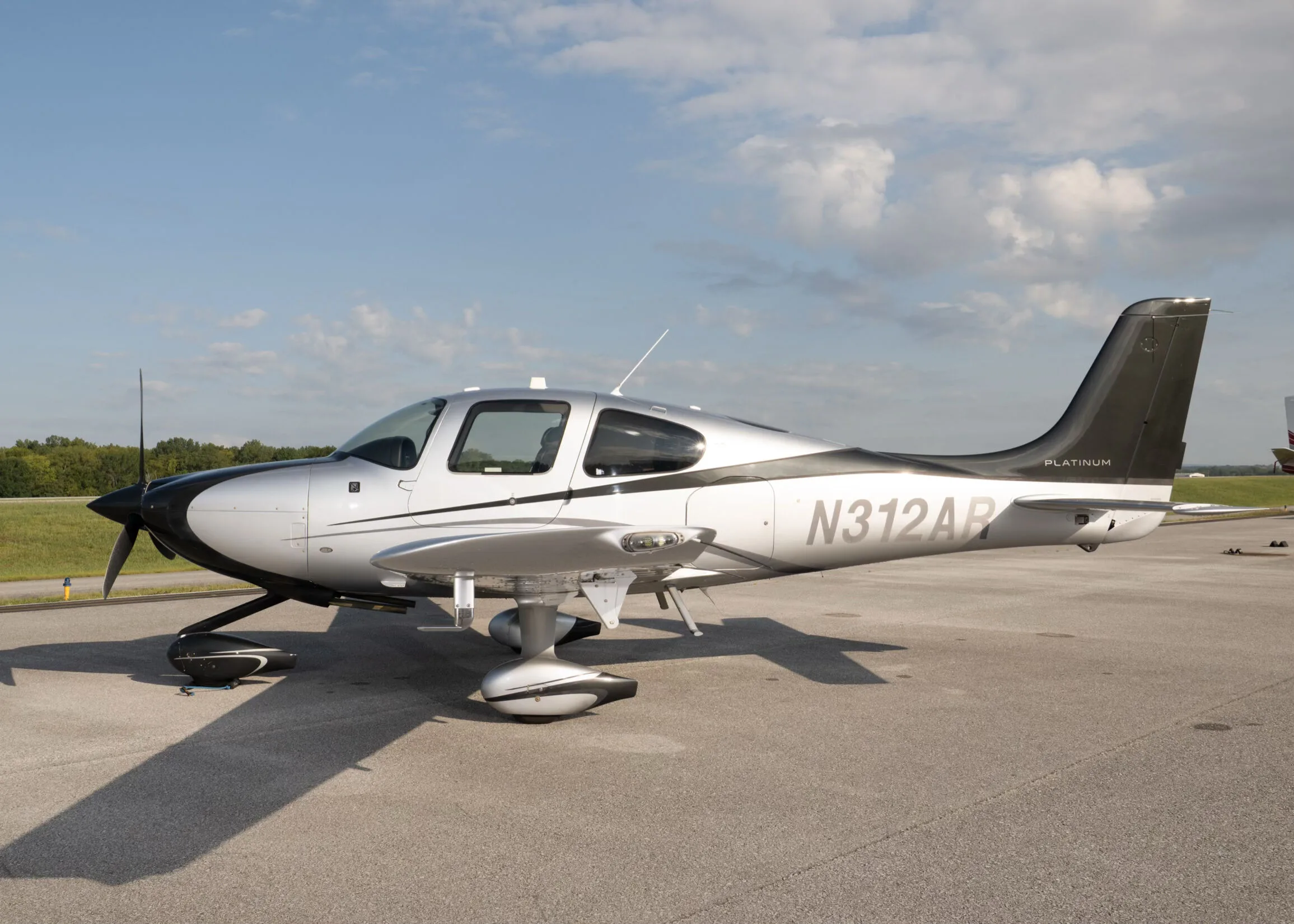 Exterior view of a 2015 Cirrus SR20-G3, N312AR.
