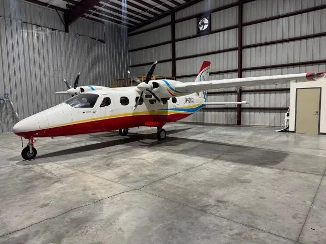 Exterior view of a 2022 TECNAM P2012 TRAVELLER, N401CJ.