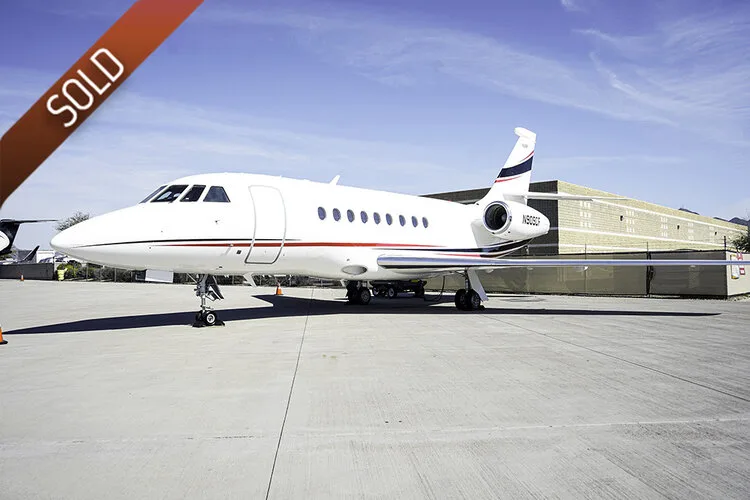 Exterior view of a 2003 Dassault Falcon 2000EX SN 004 N909CF | Hopkinson Luxury Aircraft Sales, N909CF.