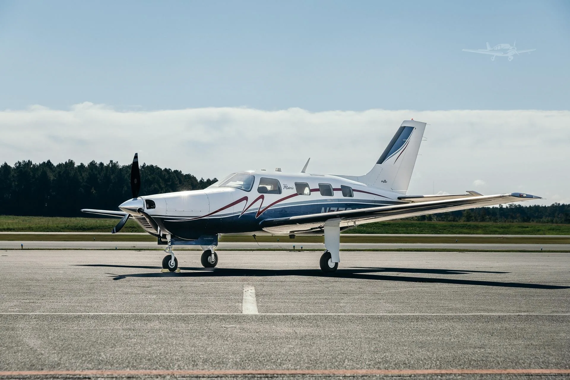 Exterior view of a 2011 PIPER MALIBU MATRIX, N7734A.