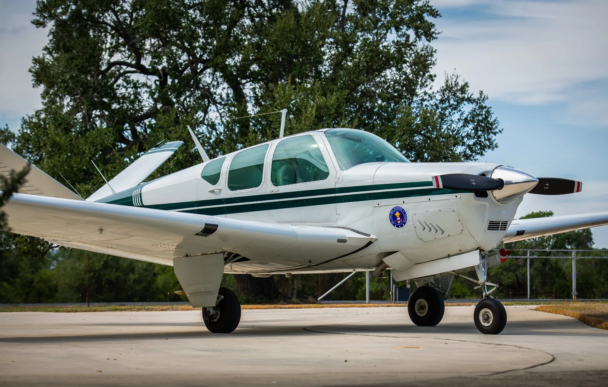 Exterior view of a 1957 Beechcraft H35 Bonanza, N474Z.