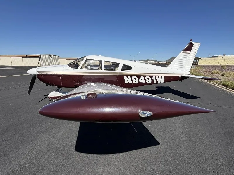 Exterior view of a 1969 Piper Cherokee 235, N9491W.