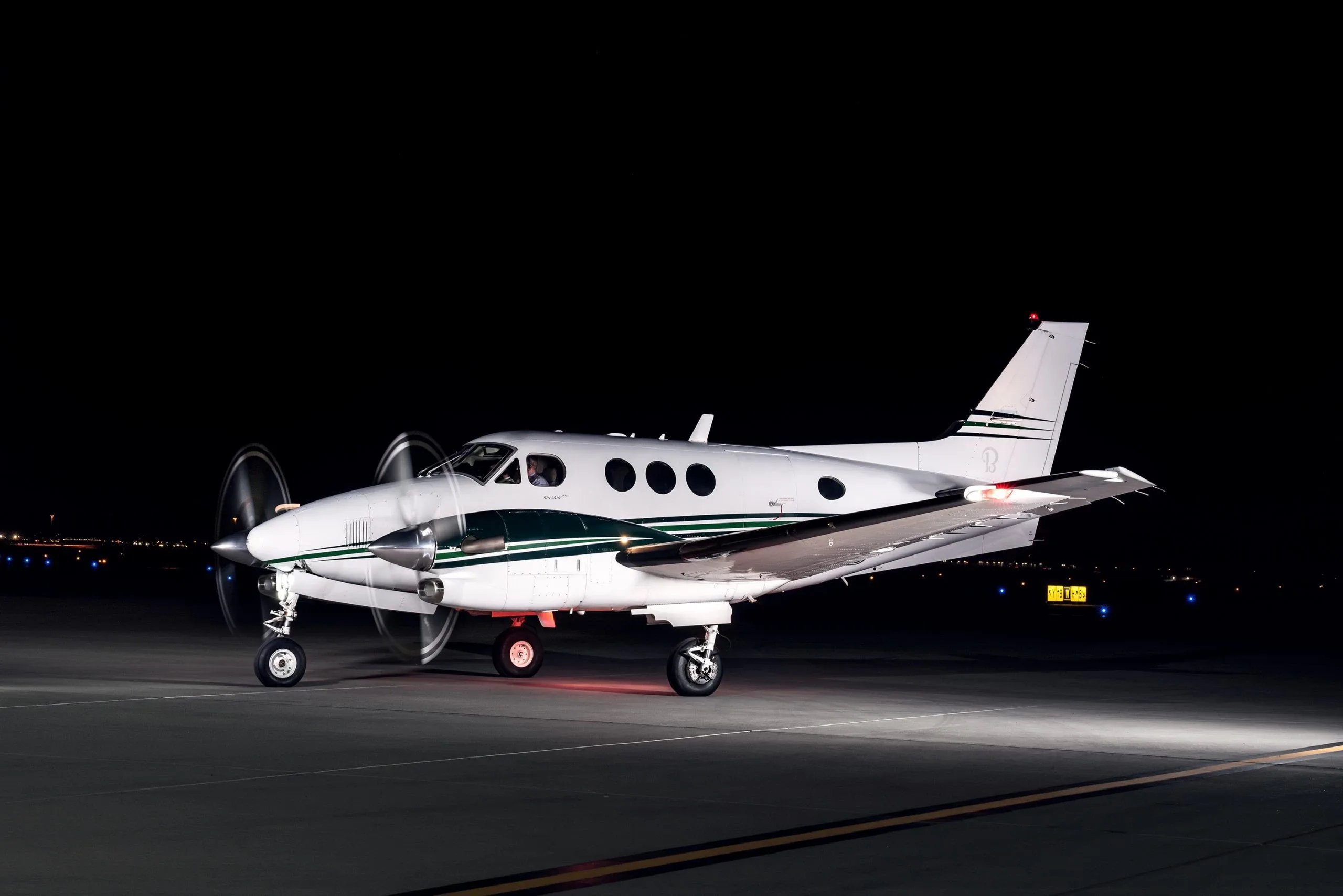 Exterior view of a Beechcraft Textron King Air 200, N576CL.