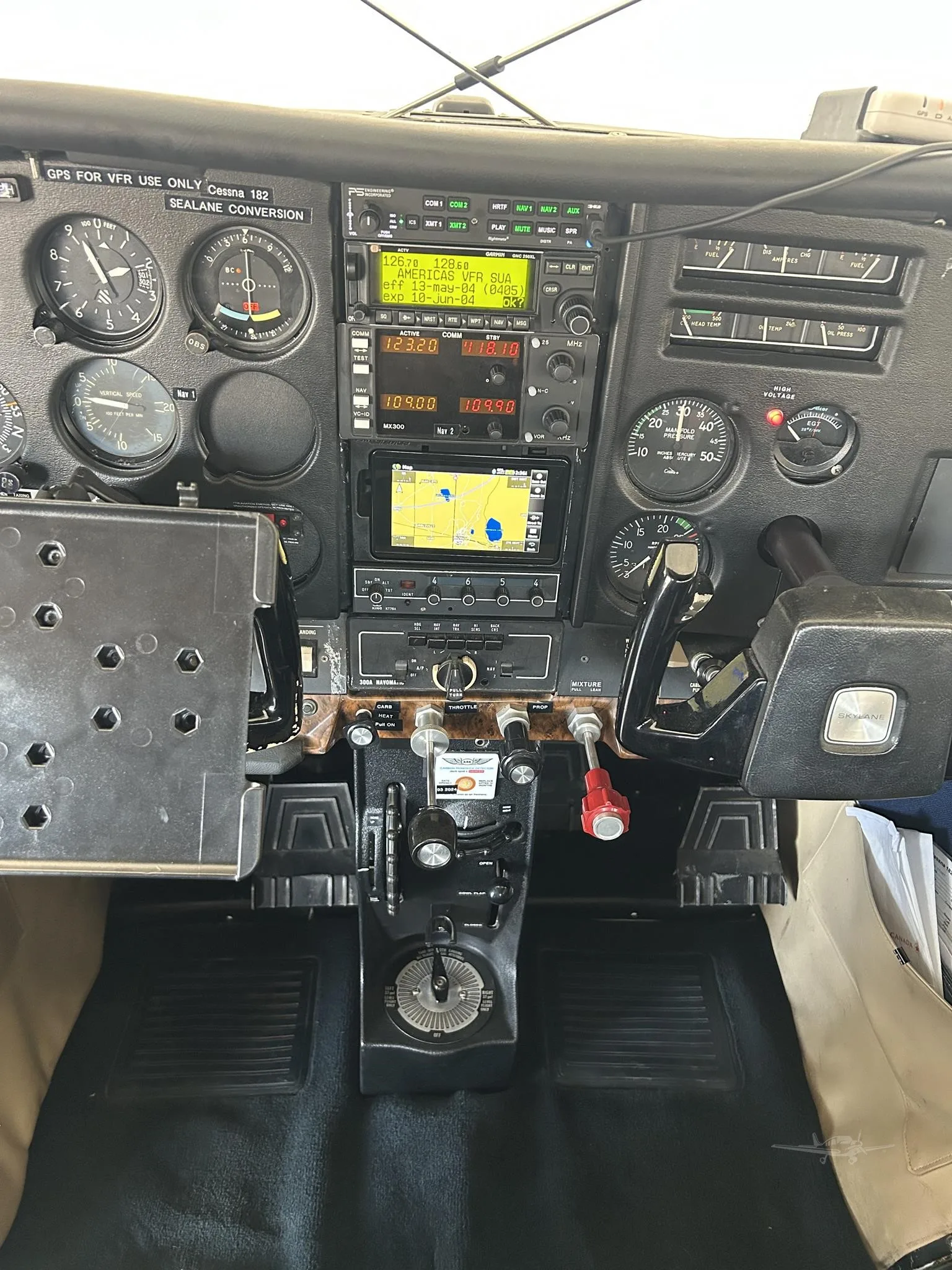 Cockpit and instrument panel of a 1976 CESSNA 182P SKYLANE.