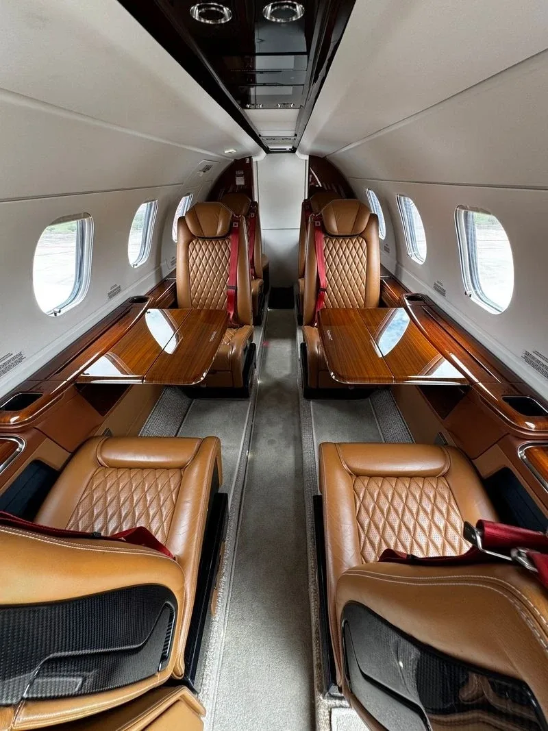 Cabin interior of a 2018 Embraer Phenom 300E.