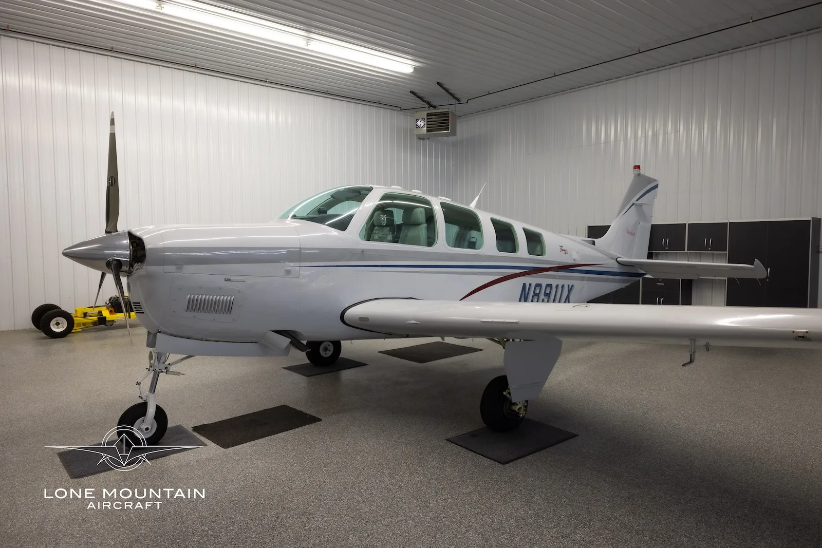 Exterior view of a 1998 Beechcraft A36 Bonanza, N8911X.