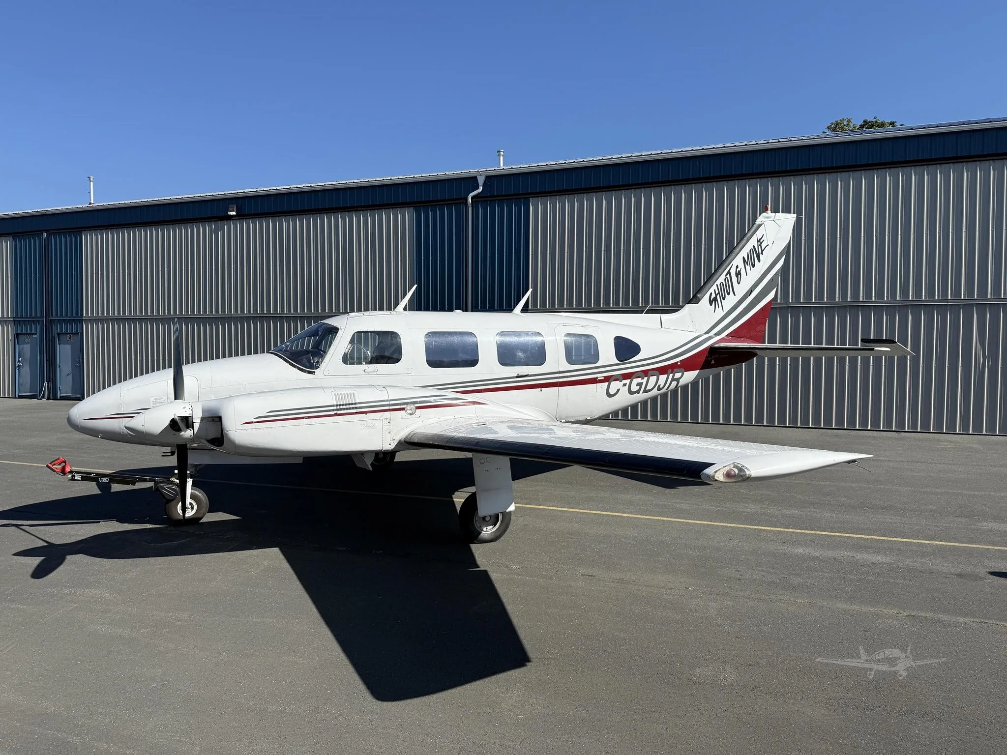 Exterior view of a 1968 PIPER NAVAJO, C-GDJR.