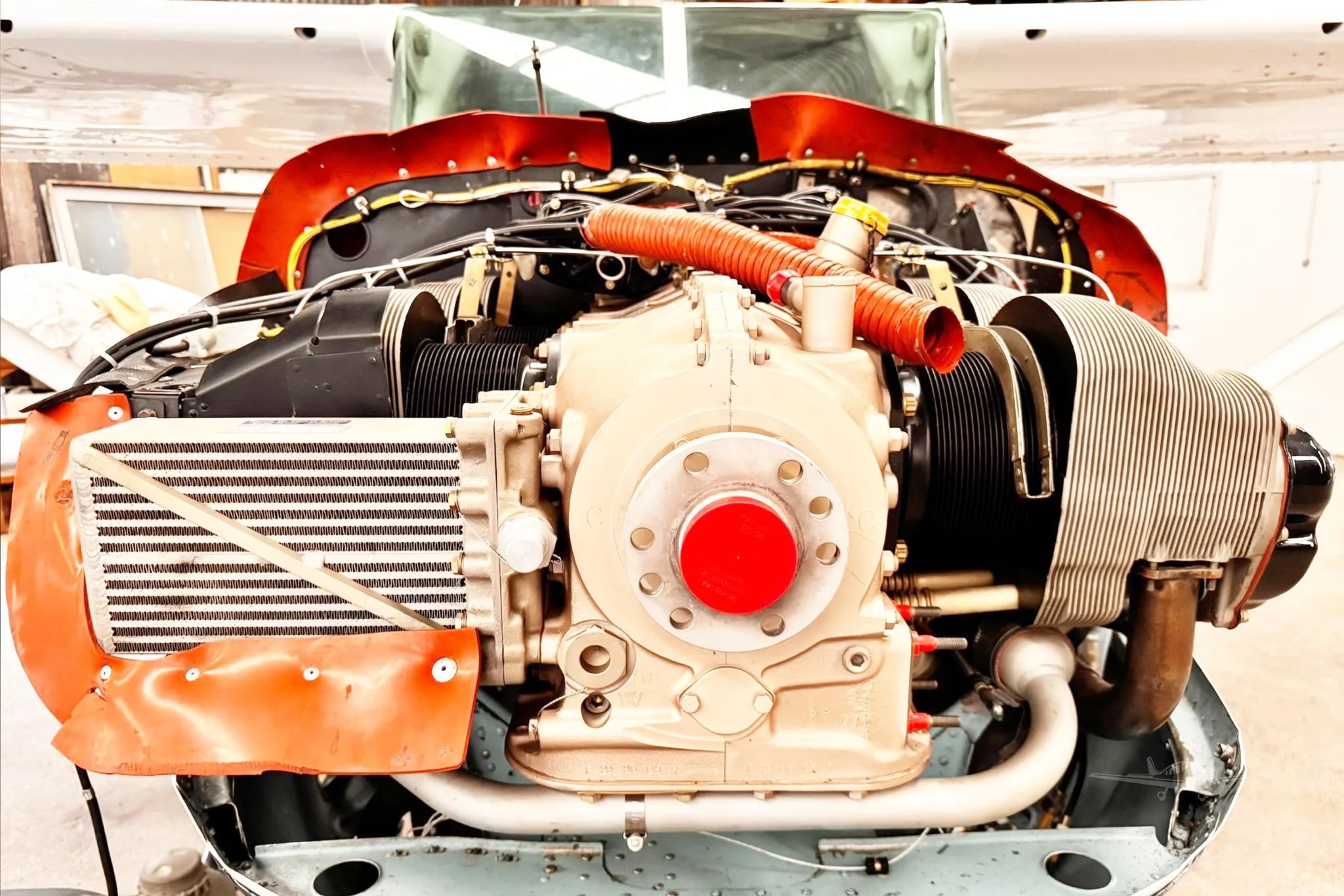 Engine detail of a 1964 CESSNA U206 SUPER SKYWAGON.