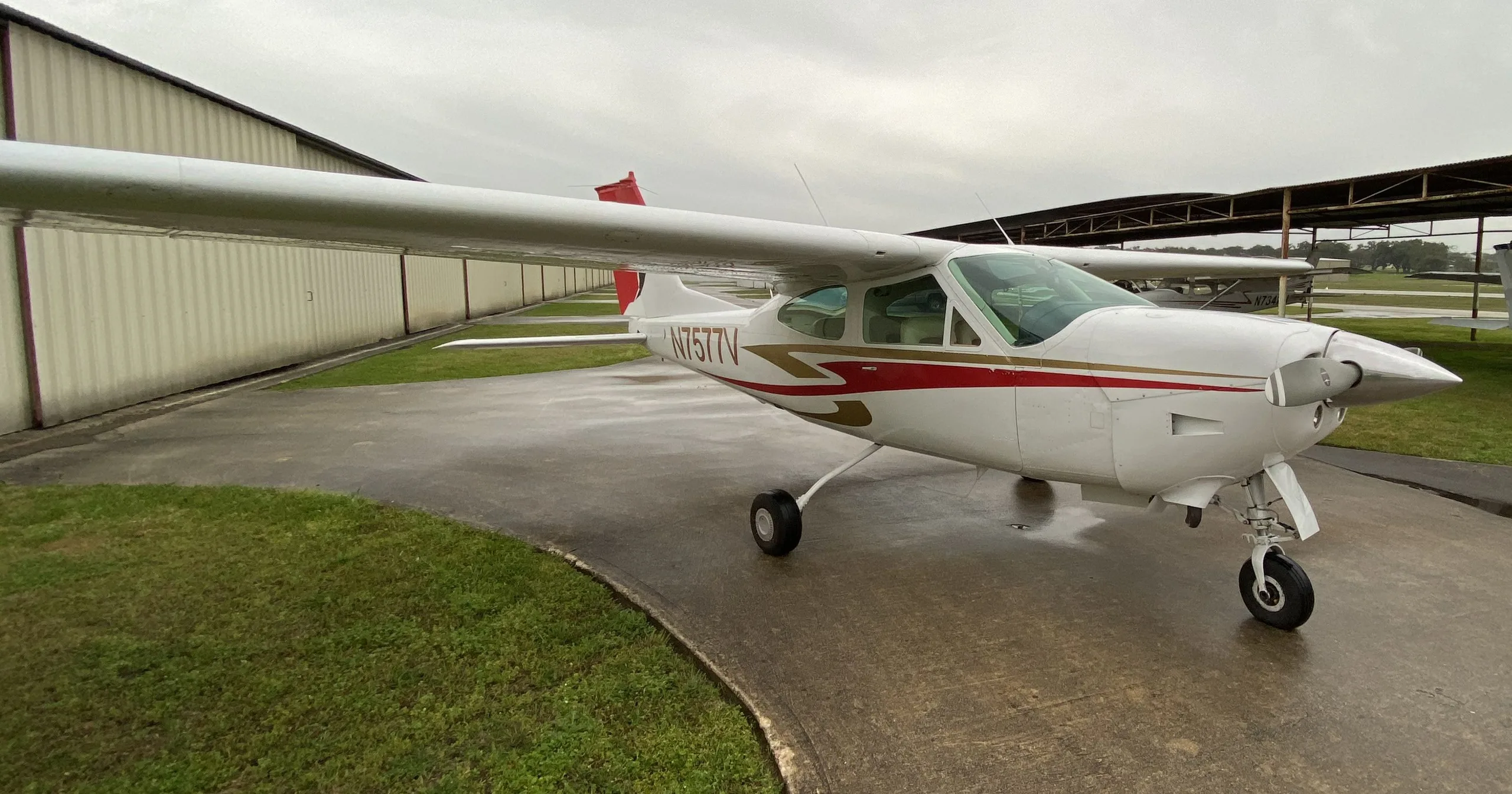 Exterior view of a 1976, N7577V.