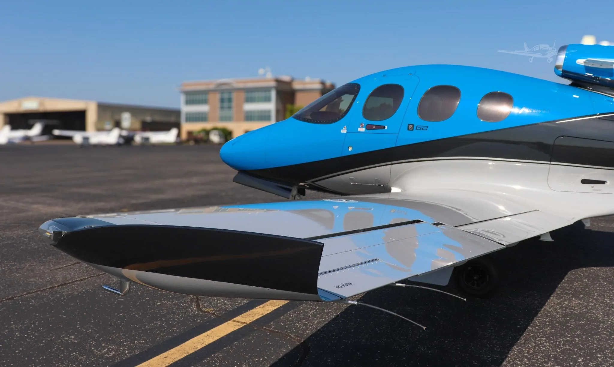 Exterior view of a 2021 CIRRUS VISION SF50-G2+, N818LL.