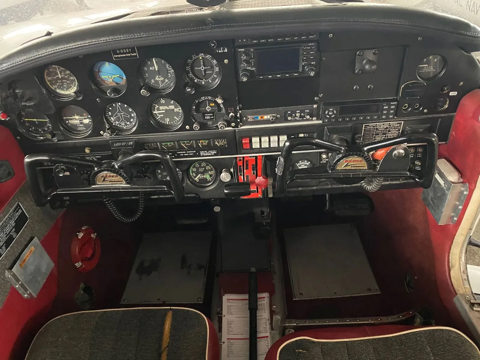 Cockpit and instrument panel of a 1973 Piper PA-28-140 Cherokee.