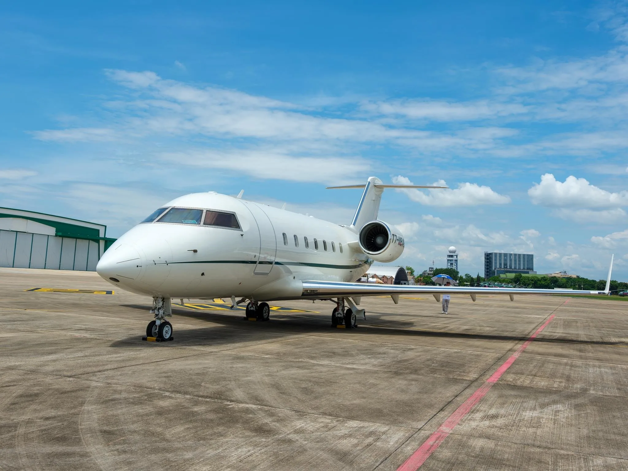 Exterior view of a 2006 BOMBARDIER CHALLENGER 604, T7-MBA8.