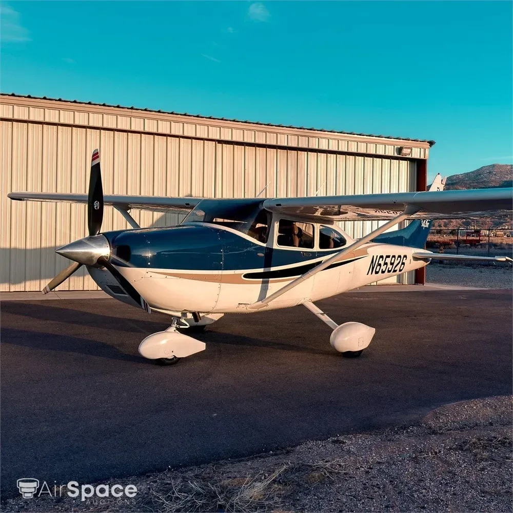 Exterior view of a 2004 Cessna T182 T, N65926.