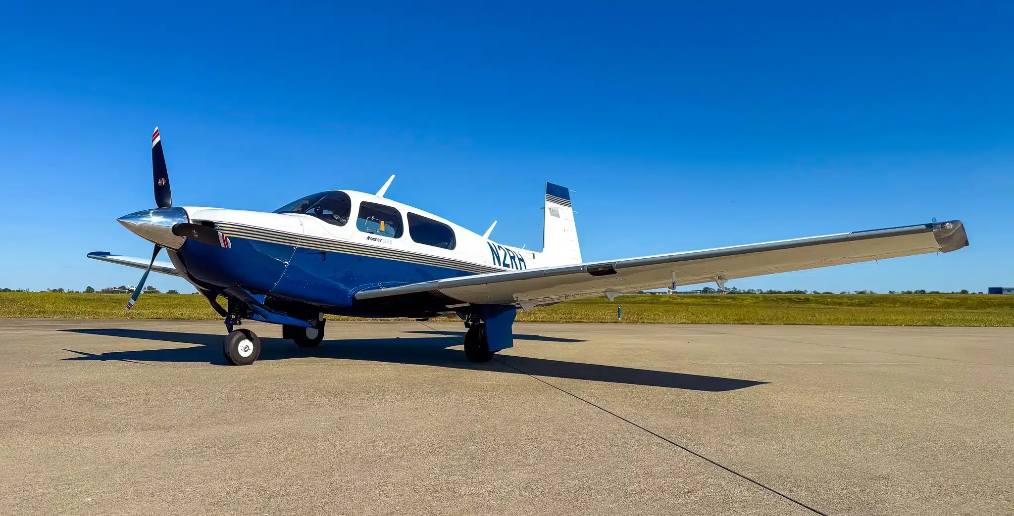 Exterior view of a 1977 Mooney M20J, N201SL.