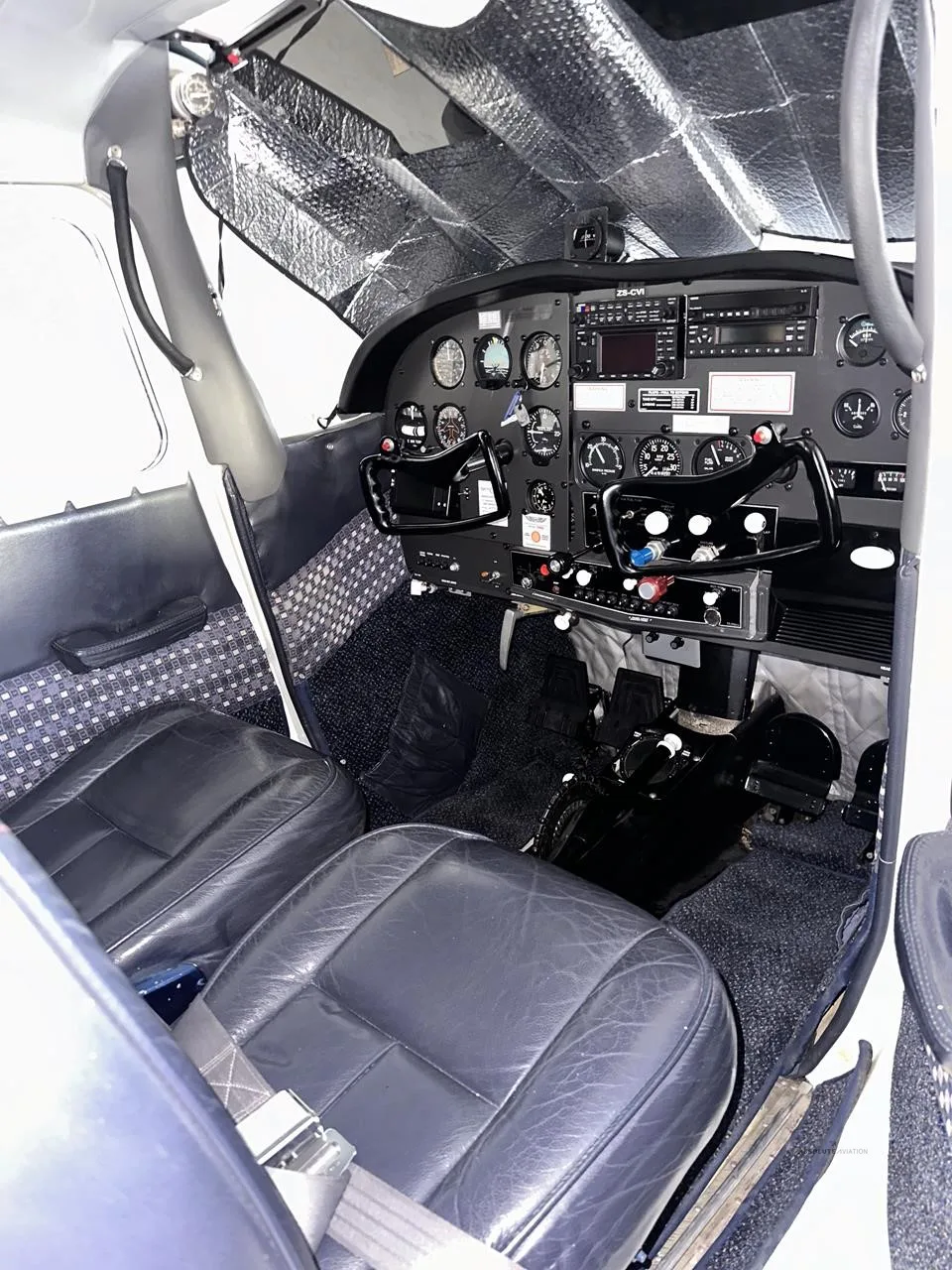 Cockpit and instrument panel of a 1962 CESSNA 185.