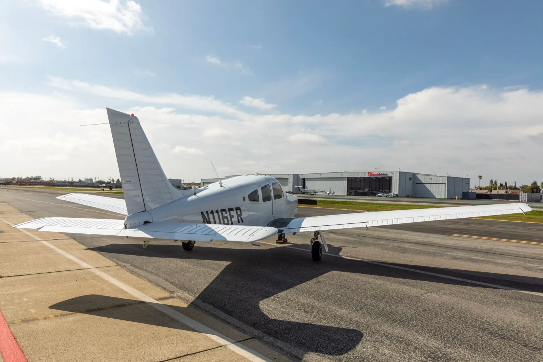 Exterior view of a 2014 Piper Arrow III, N116FR.