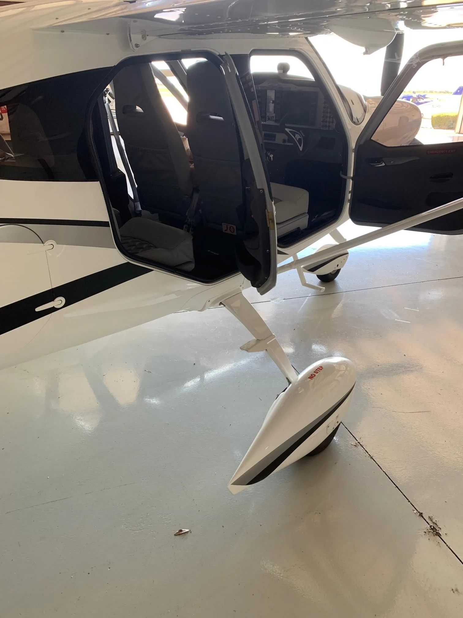 Exterior view of a 2021 TECNAM P2010, N1102T.